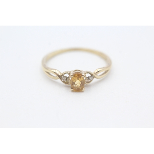 76 - 9ct gold oval cut citrine & diamond ring (1.5g) Size S 1/2