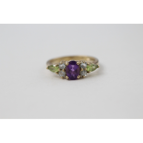 8 - 9ct gold amethyst, peridot and blue topaz ring (2.4g) Size O