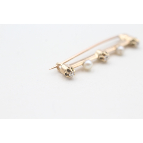 87 - 15ct gold diamond & pearl bar brooch with a 9ct gold pin (2g)