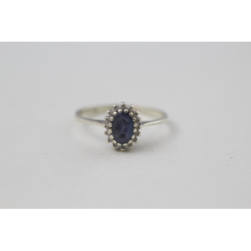 9 - 9ct gold sapphire and diamond halo ring (1.5g) Size K 1/2