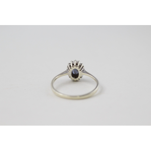 9 - 9ct gold sapphire and diamond halo ring (1.5g) Size K 1/2