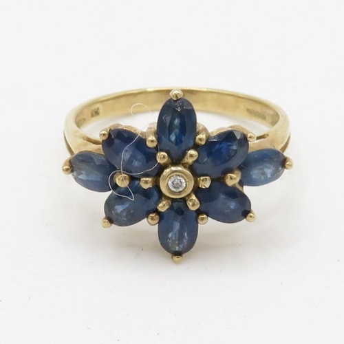 93 - 9ct gold diamond and sapphire flower cluster ring (3.1g) Size  N