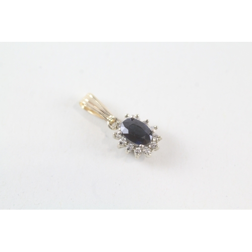 10 - 14ct gold sapphire and diamond halo pendant (1g)