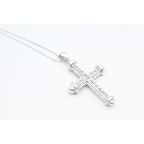 102 - 9ct white gold diamond cross pendant necklace (3.5g)