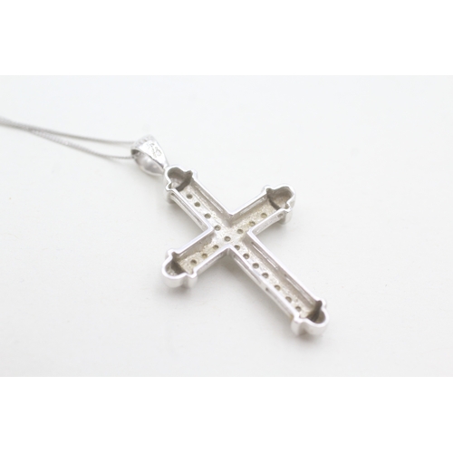 102 - 9ct white gold diamond cross pendant necklace (3.5g)