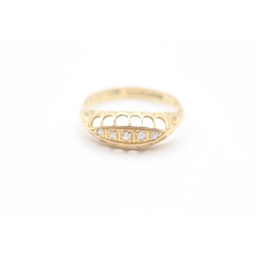 103 - 18ct gold vintage bezel set diamond five stone dress ring with open gallery (2.3g)