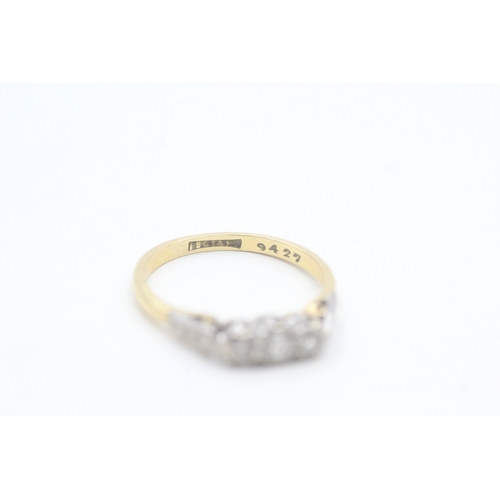 108 - 18ct gold vintage diamond three stone ring (2.4g) Size  N