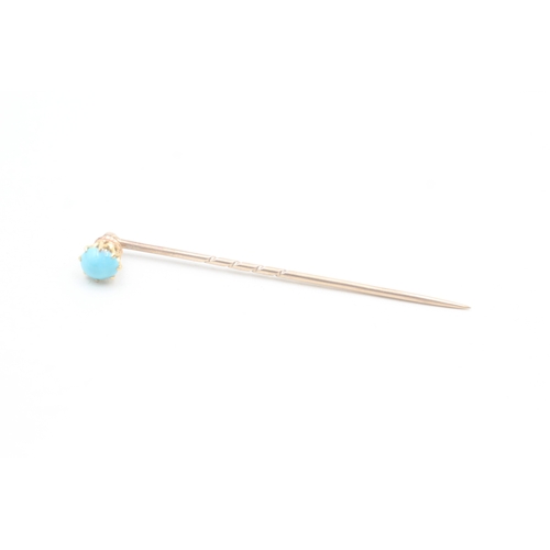 118 - 9ct gold antique turquoise stick pin (1.4g)
