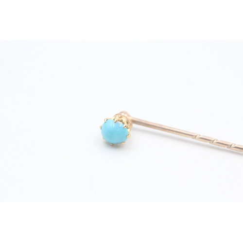 118 - 9ct gold antique turquoise stick pin (1.4g)