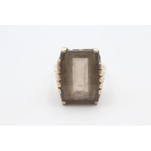 19 - 9ct gold fancy cut smokey quartz dress ring (7.6g) Size  O