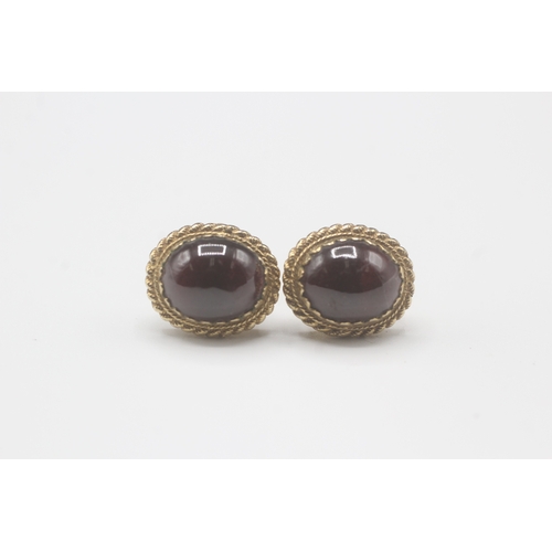 35 - 9ct gold cabochon cut garnet stud earrings (3.7g)