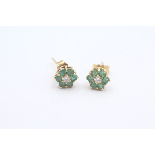 43 - 18ct gold diamond and emerald halo earrings (2.2g)