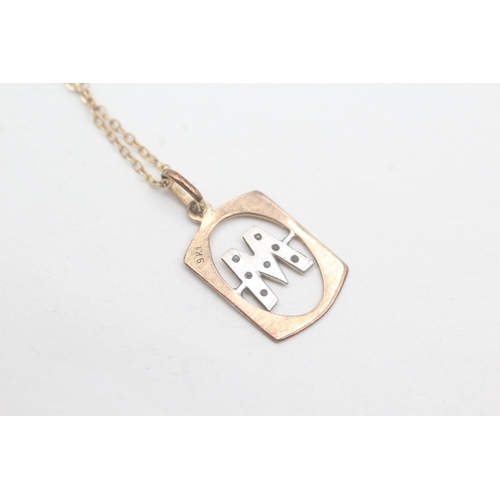 45 - 9ct gold diamond initial 'M' pendant with 9ct gold chain (1.8g)