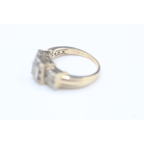 57 - 9ct gold vari cut diamond ring (3.8g) Size  M