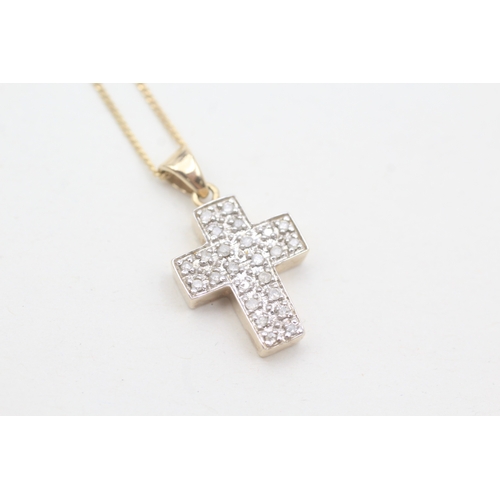 67 - 9ct gold diamond cross pendant necklace (4.2g)