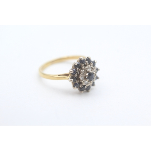 79 - 18ct gold sapphire and diamond cluster dress ring (3.8g) Size  K