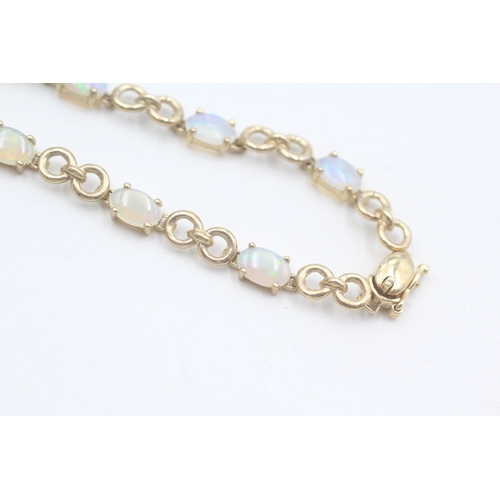 88 - 9ct gold opal bracelet (5.4g)