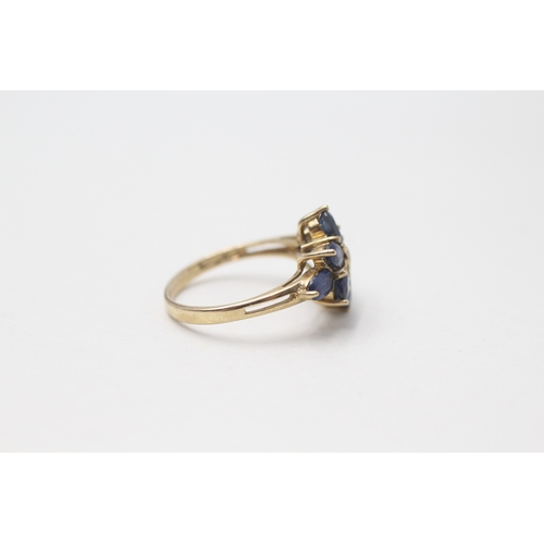 93 - 9ct gold diamond and sapphire flower cluster ring (3.1g) Size  N