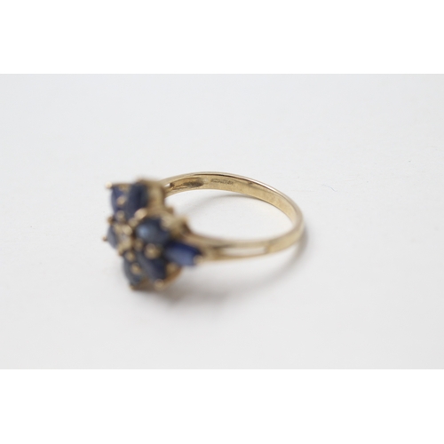 93 - 9ct gold diamond and sapphire flower cluster ring (3.1g) Size  N