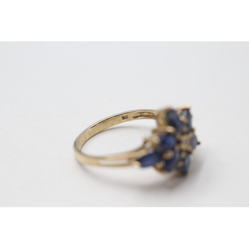 93 - 9ct gold diamond and sapphire flower cluster ring (3.1g) Size  N