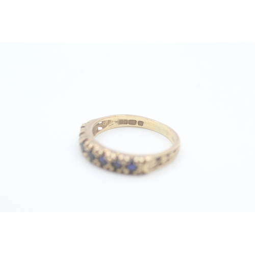 99 - 9ct gold vintage sapphire half eternity ring (2.1g) Size  K