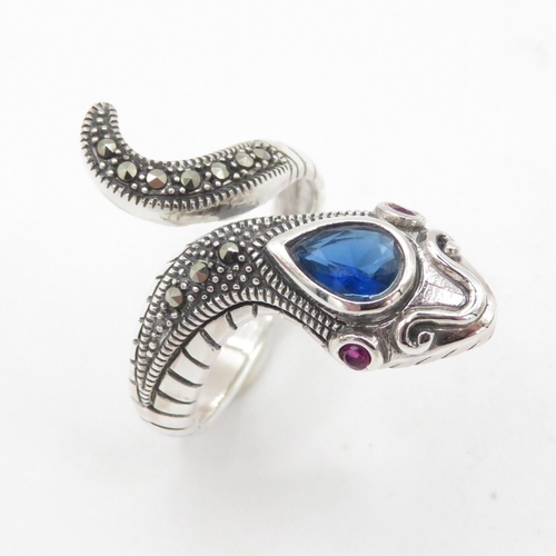 340 - HM 925 Sterling Silver snake ring with red stone eyes and blue stone head (7.2g) In excellent condit... 