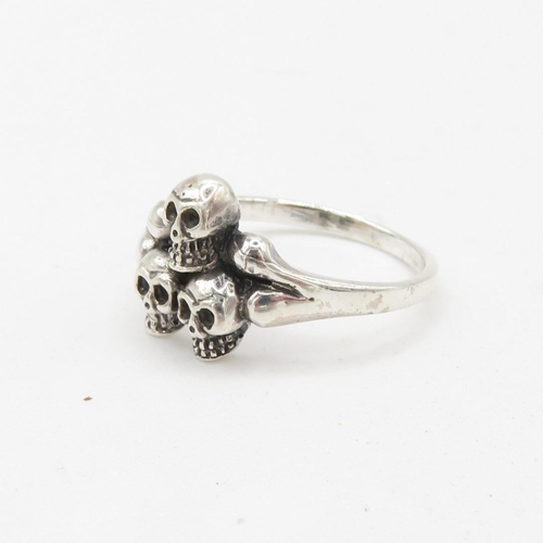 343 - HM 925 Sterling Silver triple skull ring (3.7g) In excellent condition