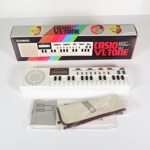 445 - Casio VL Tone VL1 boxed musical instrument and calculator