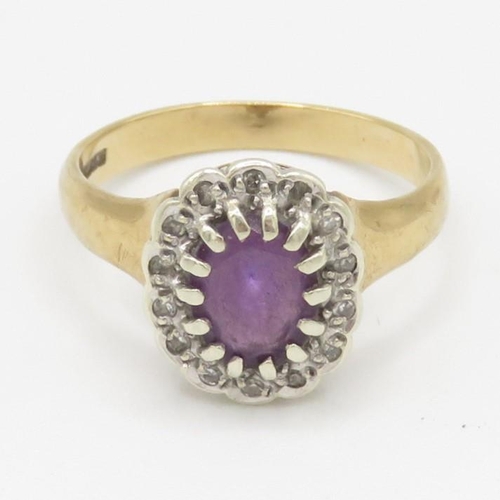 69 - 9ct gold amethyst and diamond halo set ring (3.5g) Size N