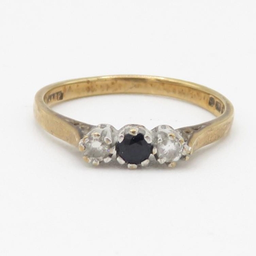 72 - 9ct gold diamond and sapphire three stone ring (1.7g) Size N 1/2