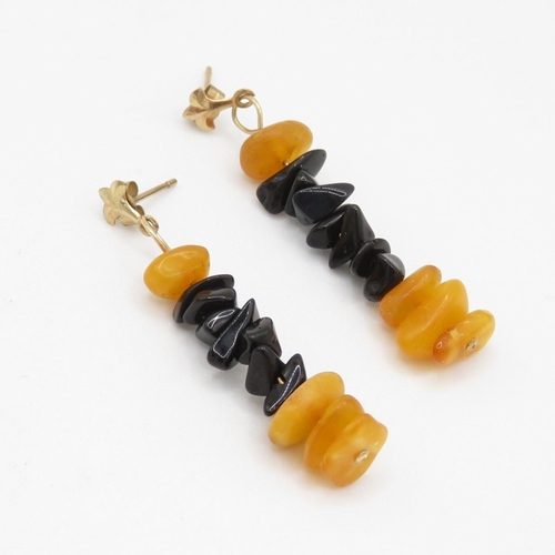 74 - 9ct gold black onyx & amber drop earrings (2.3g)