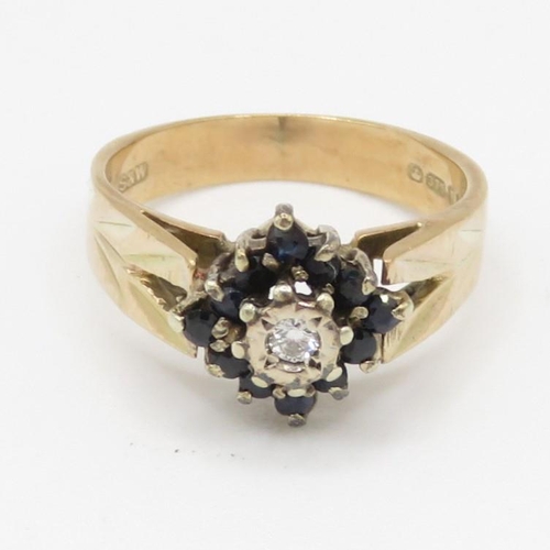 75 - 9ct gold diamond and sapphire flower cluster ring (3.5g) Size K 1/2