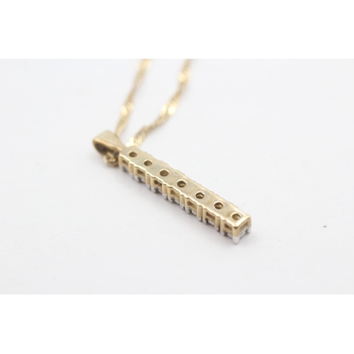 109 - 9ct gold and diamond pendant on chain (3.2g)