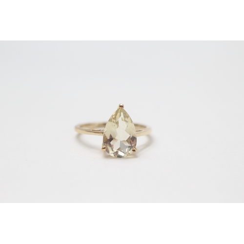 22 - 9ct gold and pear shaped heliodor ring (2.2g) Size O