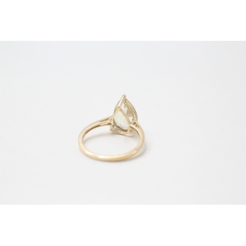 22 - 9ct gold and pear shaped heliodor ring (2.2g) Size O