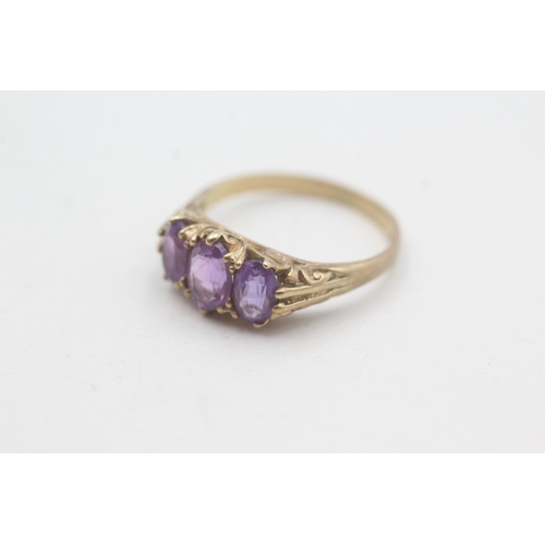 29 - 9ct gold three stone amethyst ring (2.6g)  Size O 1/2