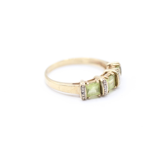 33 - 9ct gold diamond and peridot ring (2.8g) Size Q