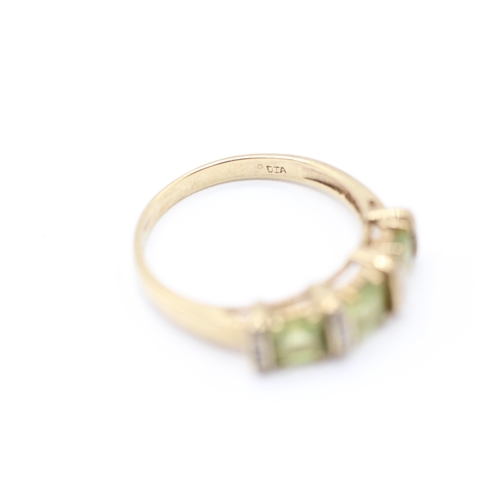 33 - 9ct gold diamond and peridot ring (2.8g) Size Q