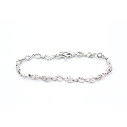 34 - 9ct gold and diamond bracelet (5.5g)