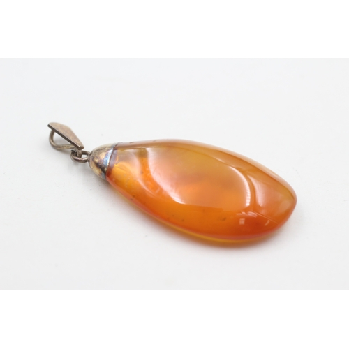 51 - 9ct gold vintage amber pendant (5.6g)