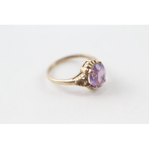 53 - 9ct gold purple stone ring (1.9g) Size L