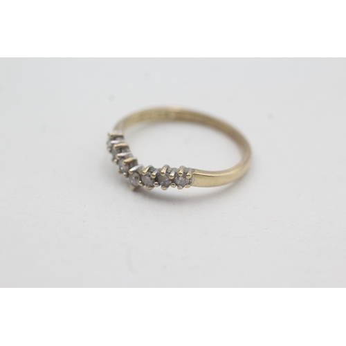 54 - 9ct gold seven diamond wishbone ring (1.5g) Size M