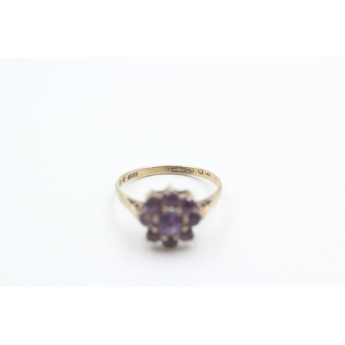 59 - 9ct gold amethyst cluster ring (2g) Size M