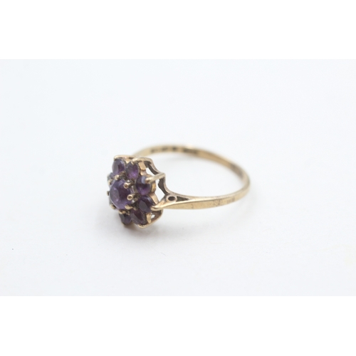 59 - 9ct gold amethyst cluster ring (2g) Size M