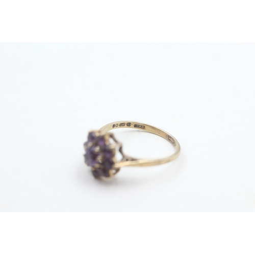 59 - 9ct gold amethyst cluster ring (2g) Size M