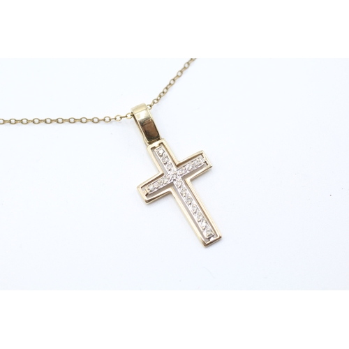 62 - 9ct gold diamond cross pendant and chain (2.4g)