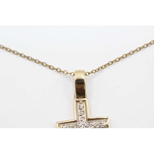 62 - 9ct gold diamond cross pendant and chain (2.4g)