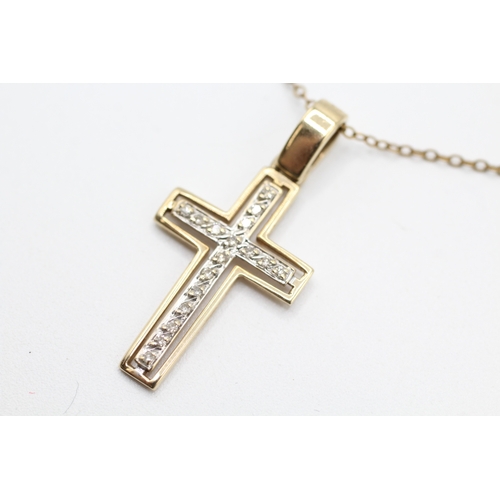 62 - 9ct gold diamond cross pendant and chain (2.4g)