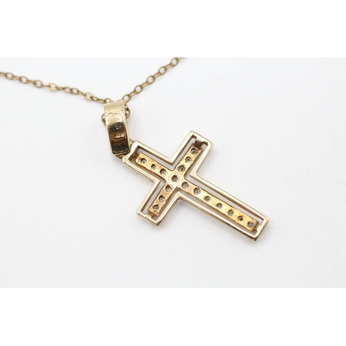 62 - 9ct gold diamond cross pendant and chain (2.4g)