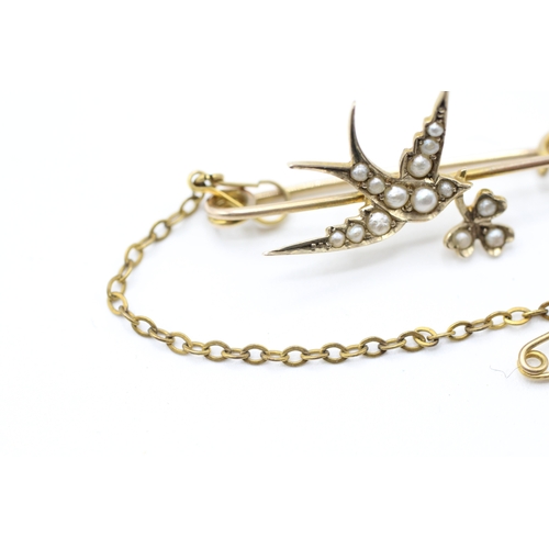 63 - 9ct gold split pearl bird brooch (1.9g)